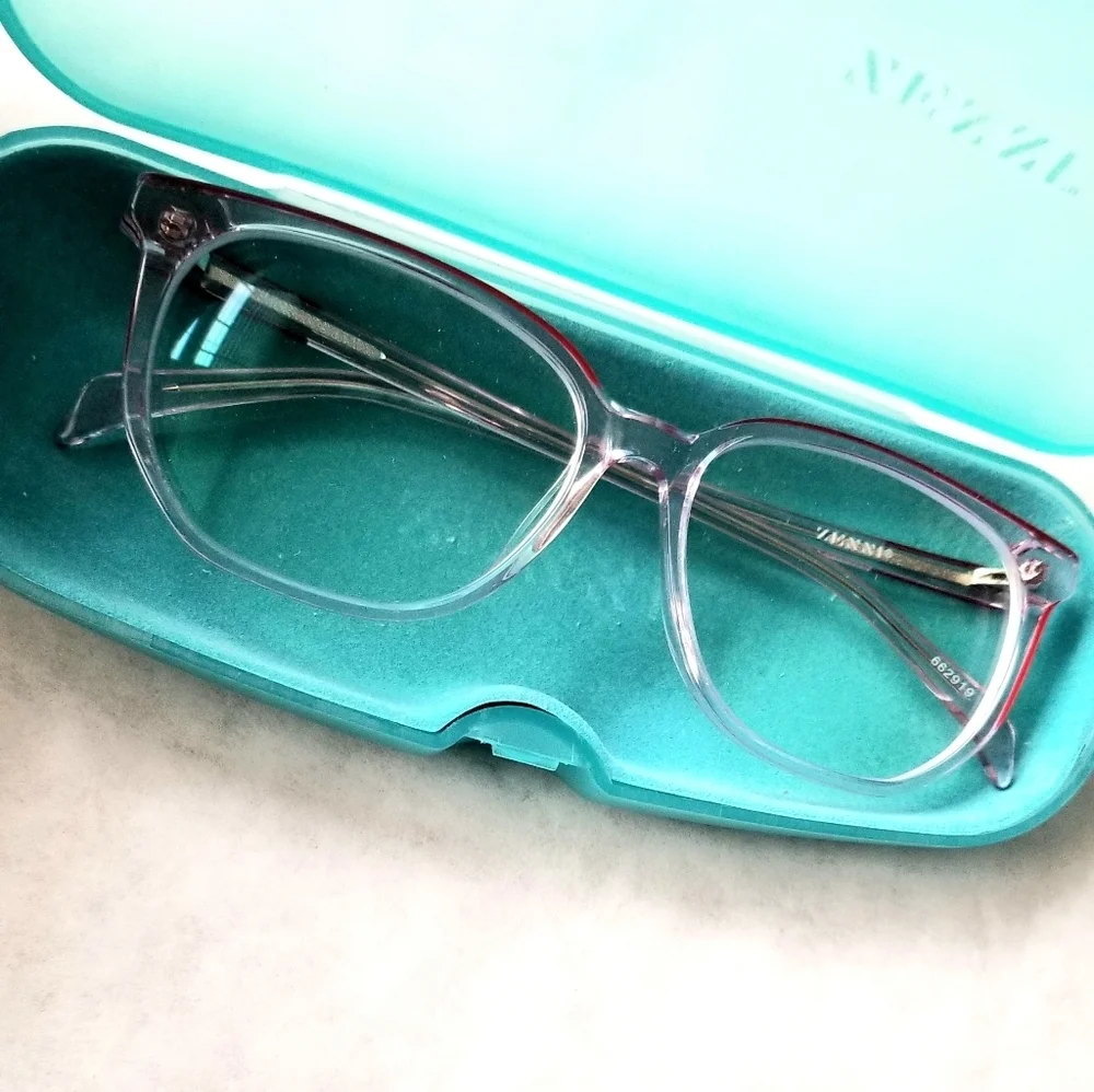 Zenni clear glass frames with red accent on top of frames with hard blue…